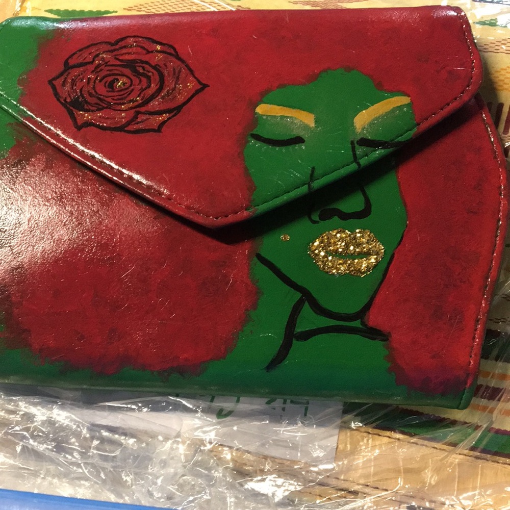 Hand painted Afro centric Couture red ,black & green clutch with strap
